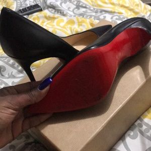 Christian Louboutin’s size 39.5